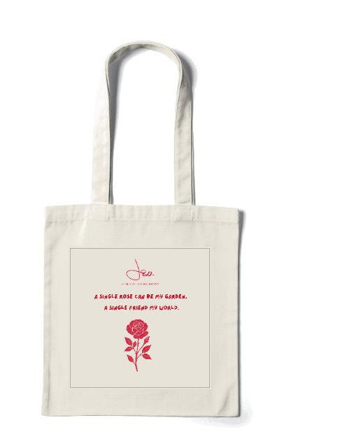 Natural canvas tote printed with a red rose and the words A single rose can be my garden, a single friend my world